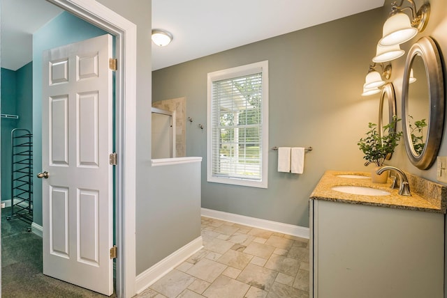 2554 Village Dr, Waynesboro, VA 22980 - full bathroom with a shower stall, double vanity, and stone finish flooring