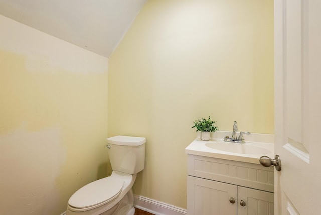 2554 Village Dr, Waynesboro, VA 22980 - half bathroom featuring vanity and vaulted ceiling
