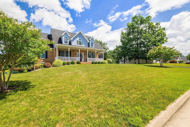 2554 Village Dr, Waynesboro, VA 22980 - cape cod-style house featuring brick siding, a porch, and a front lawn