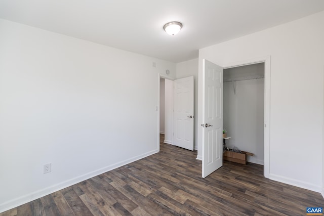 6760 Courthouse Rd, Louisa, VA 23093 - unfurnished bedroom with a closet, dark wood finished floors, and baseboards