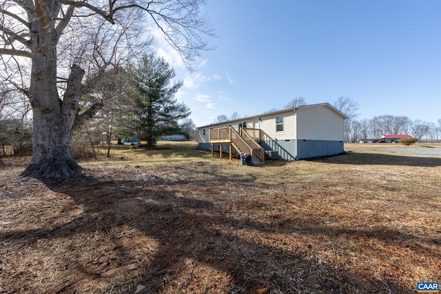 6760 Courthouse Rd, Louisa, VA 23093 - view of yard featuring stairs and a deck