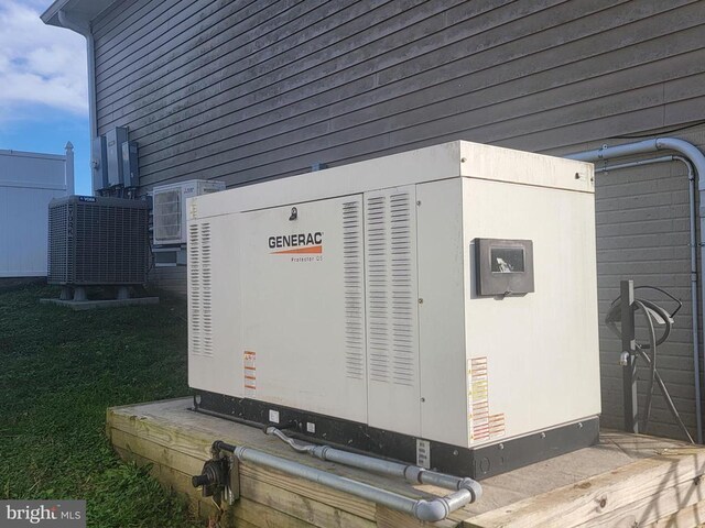 exterior view of central AC unit, a power unit, and crawl space