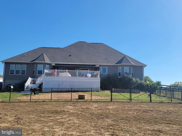 rear view of property with a deck