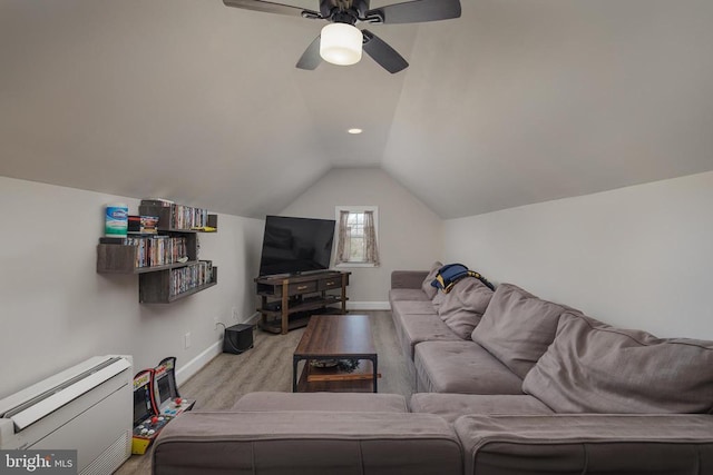 living room with baseboards, lofted ceiling, a ceiling fan, and recessed lighting