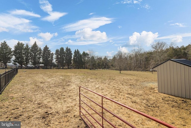 view of yard with fence and an enclosed riding area