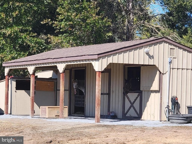 view of outbuilding with an exterior structure and an outdoor structure