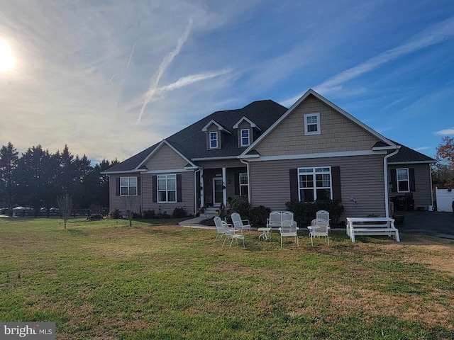 craftsman inspired home with a front yard