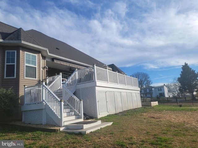 back of house with stairs
