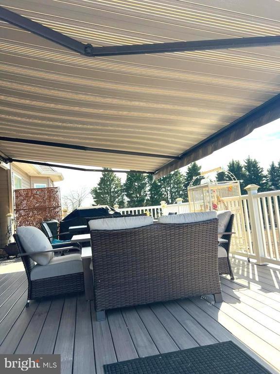 deck with an outdoor hangout area