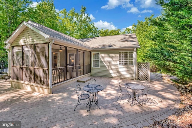 104 Tall Pines Ave, Locust Grove, VA 22508 - view of patio with a sunroom and outdoor dining space