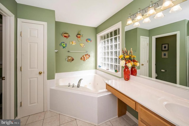104 Tall Pines Ave, Locust Grove, VA 22508 - bathroom with a tub with jets, vanity, toilet, and tile patterned floors