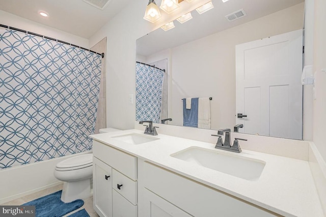 8532 Sylvannah Dr, Spotsylvania, VA 22551 - bathroom with toilet, double vanity, shower / bath combo with shower curtain, and recessed lighting