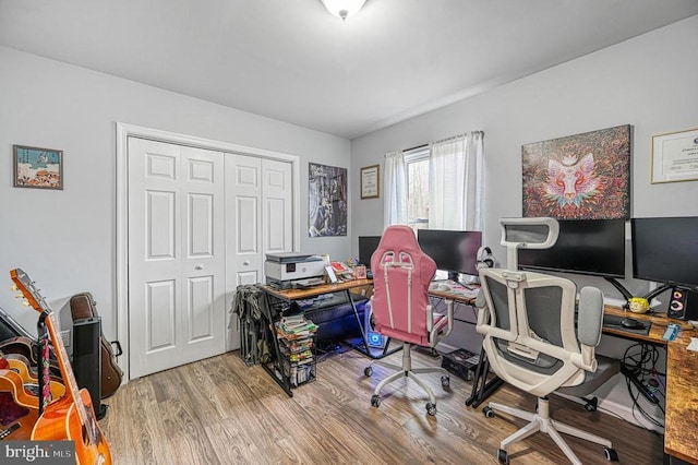 office space with wood finished floors
