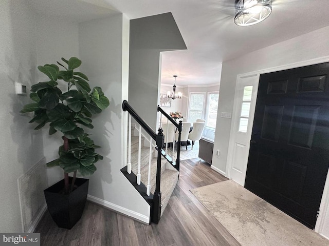 108 Valley View Rd, Fredericksburg, VA 22407 - foyer entrance with wood finished floors, baseboards, and a chandelier