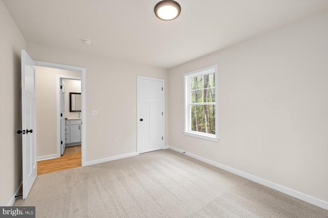 358 Hemlock Ln, Mineral, VA 23117 - unfurnished bedroom featuring carpet and baseboards