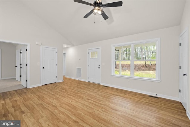 358 Hemlock Ln, Mineral, VA 23117 - unfurnished living room with light wood-style floors, ceiling fan, baseboards, and high vaulted ceiling
