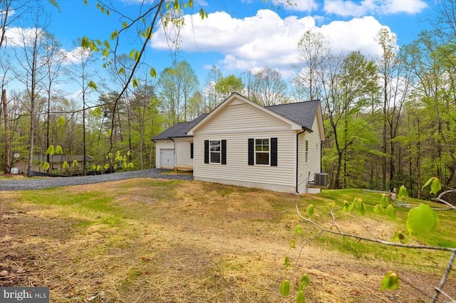 358 Hemlock Ln, Mineral, VA 23117 - view of home's exterior with a garage, driveway, and central AC
