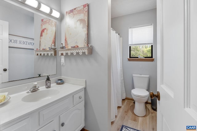 2 Amethyst Rd, Palmyra, VA 22963 - full bath with wood finished floors, toilet, vanity, and baseboards