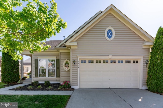 6304 Dranesville Dr W, Fredericksburg, VA 22407 - view of front of house with concrete driveway and an attached garage