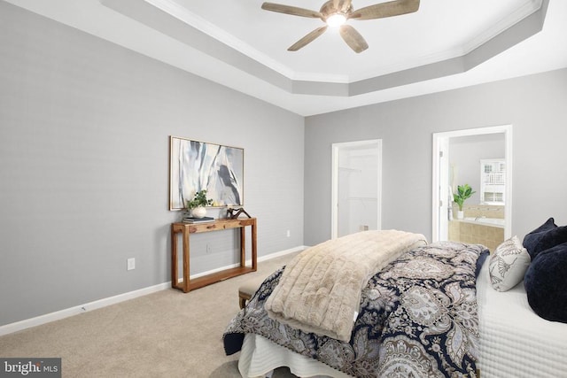 6304 Dranesville Dr W, Fredericksburg, VA 22407 - carpeted bedroom with a raised ceiling, crown molding, baseboards, a spacious closet, and connected bathroom
