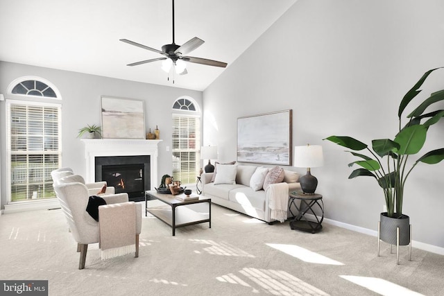 6304 Dranesville Dr W, Fredericksburg, VA 22407 - living room featuring carpet floors, healthy amount of natural light, baseboards, and high vaulted ceiling