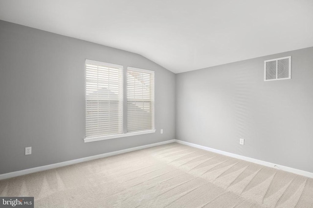 6304 Dranesville Dr W, Fredericksburg, VA 22407 - spare room with lofted ceiling, carpet flooring, and baseboards