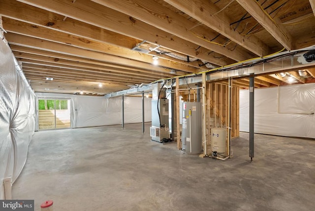  - below grade area with water heater, heating unit, and a water pressure tank