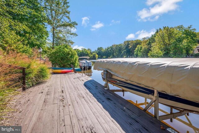 wooden deck with a dock
