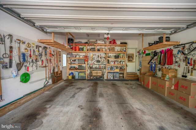 garage with a workshop area