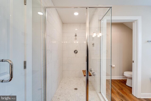 26288 Wisdom Tree Ln, Unionville, VA 22567 - bathroom featuring a shower stall, toilet, wood finished floors, and recessed lighting