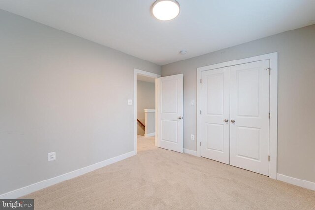 26288 Wisdom Tree Ln, Unionville, VA 22567 - unfurnished bedroom featuring carpet floors, baseboards, and a closet