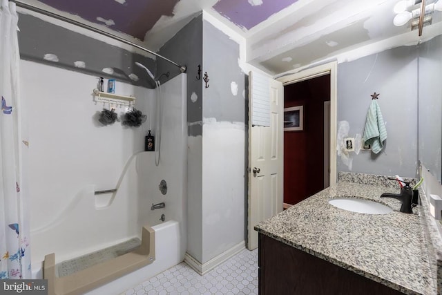 full bathroom with shower / bathtub combination with curtain and vanity