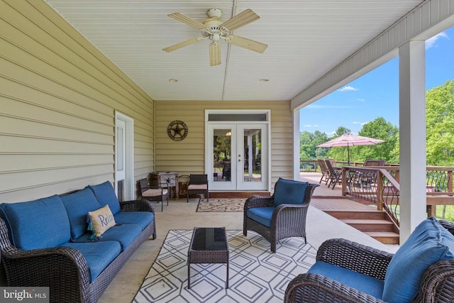 view of patio featuring outdoor lounge area, french doors, a deck, ceiling fan, and outdoor dining area