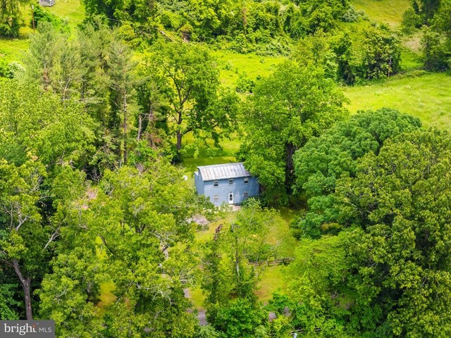  - view from above of property featuring a heavily wooded area
