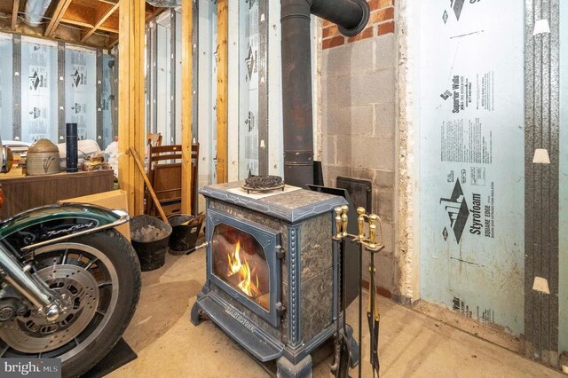 6117 Block House Rd, Partlow, VA 22534 - basement with a wood stove