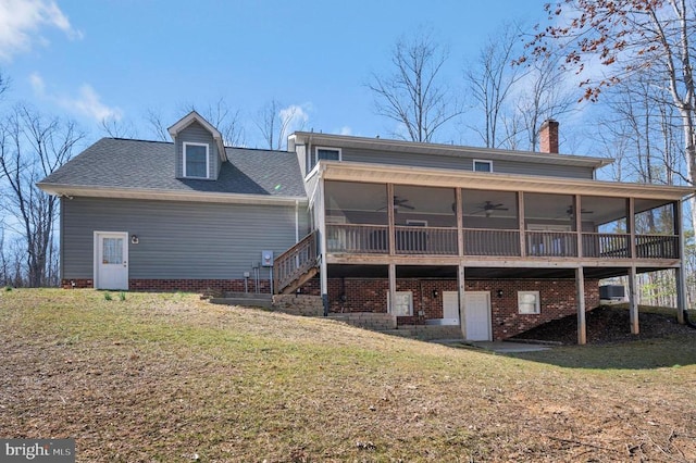 6117 Block House Rd, Partlow, VA 22534 - rear view of house with a sunroom, ceiling fan, and a yard
