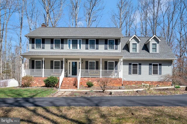 6117 Block House Rd, Partlow, VA 22534 - view of front facade featuring a porch, a chimney, and a shingled roof