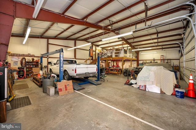 6117 Block House Rd, Partlow, VA 22534 - garage featuring a workshop area