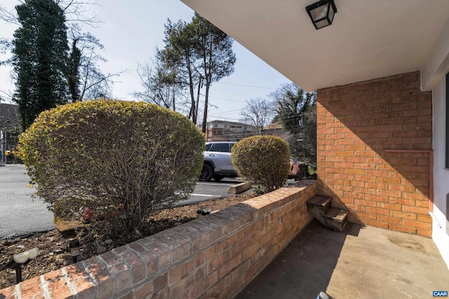 1800 Jefferson Park Ave Unit 39, Charlottesville, VA 22903 - view of side of property featuring brick siding