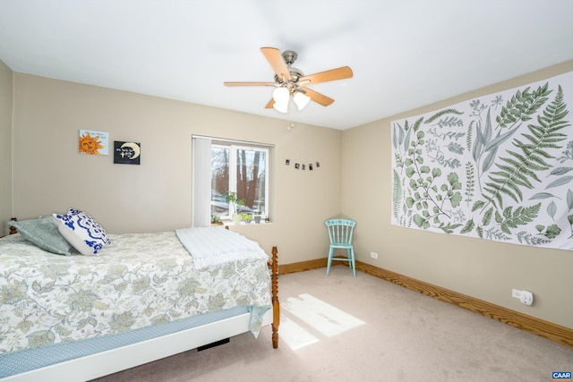 1800 Jefferson Park Ave Unit 39, Charlottesville, VA 22903 - bedroom with baseboards, carpet flooring, and ceiling fan
