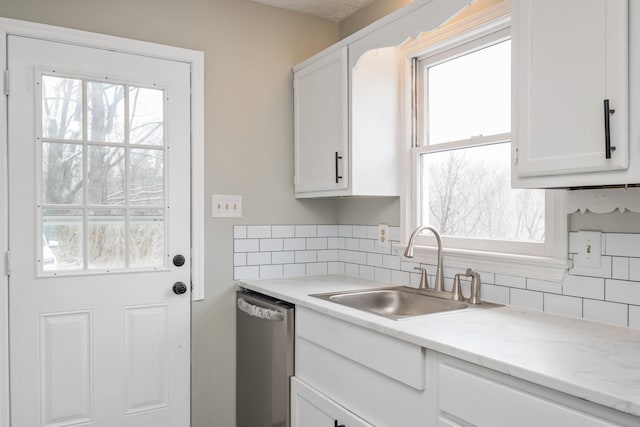 129 Hillwood Dr, Front Royal, VA 22630 - kitchen with dishwasher, decorative backsplash, white cabinetry, and plenty of natural light