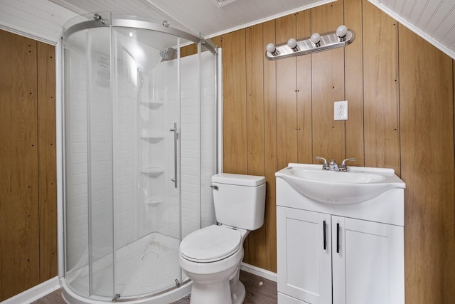 129 Hillwood Dr, Front Royal, VA 22630 - bathroom with a shower stall, vanity, and wooden walls