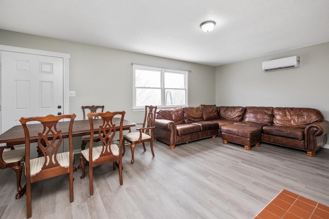 129 Hillwood Dr, Front Royal, VA 22630 - living room with a wall unit AC and light wood finished floors