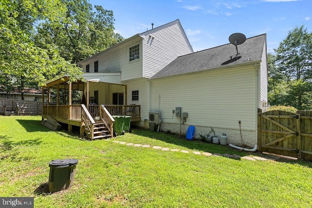 12407 Salient Ln, Spotsylvania, VA 22551 - rear view of property featuring a gate, a deck, and roof with shingles