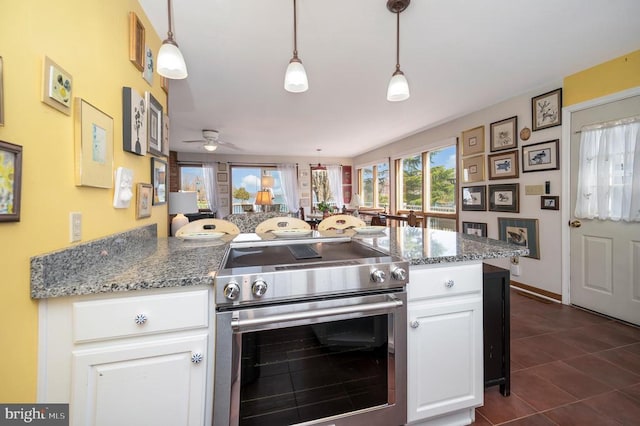 107 Ramsay Rd, Locust Grove, VA 22508 - kitchen featuring electric stove, white cabinets, ceiling fan, dark tile patterned floors, and light stone counters