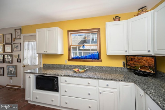 107 Ramsay Rd, Locust Grove, VA 22508 - kitchen with black microwave, healthy amount of natural light, and white cabinets