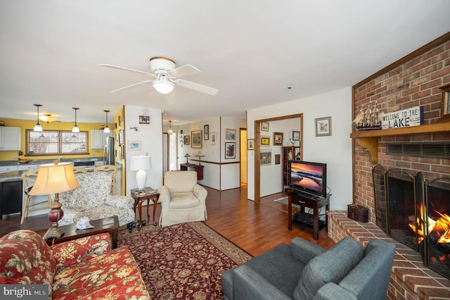 107 Ramsay Rd, Locust Grove, VA 22508 - living room with a ceiling fan, a fireplace, and dark wood-style flooring