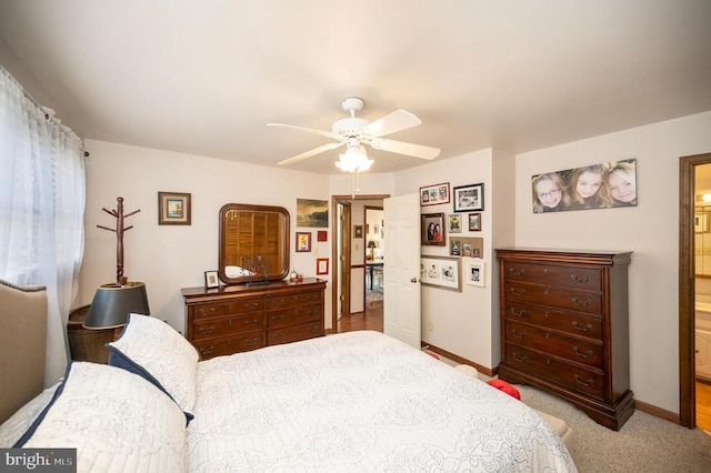 107 Ramsay Rd, Locust Grove, VA 22508 - bedroom featuring baseboards, carpet flooring, ceiling fan, and connected bathroom