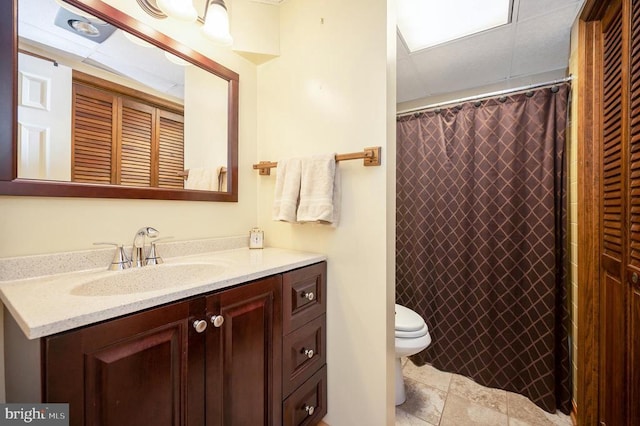 107 Ramsay Rd, Locust Grove, VA 22508 - full bathroom featuring vanity, toilet, curtained shower, and a drop ceiling
