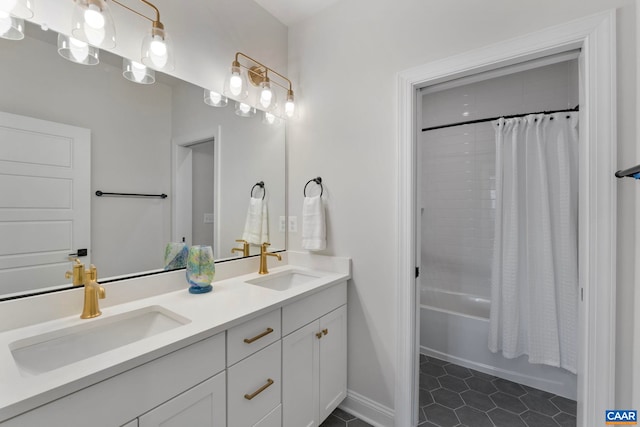 1115 Sablewood Dr, Charlottesville, VA 22911 - bathroom featuring tile patterned flooring, shower / tub combo, double vanity, and a sink